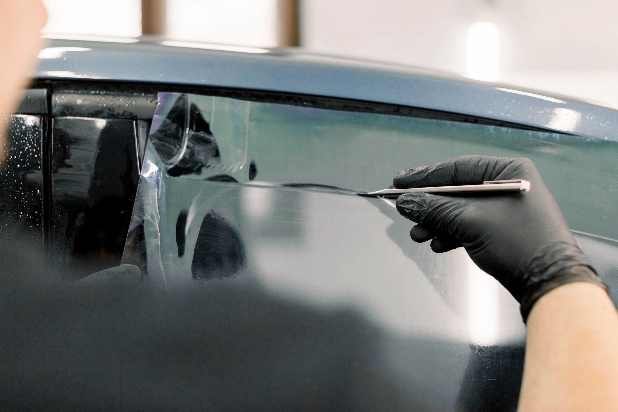 Tinted windows on a luxury vehicle highlighting style and elegance