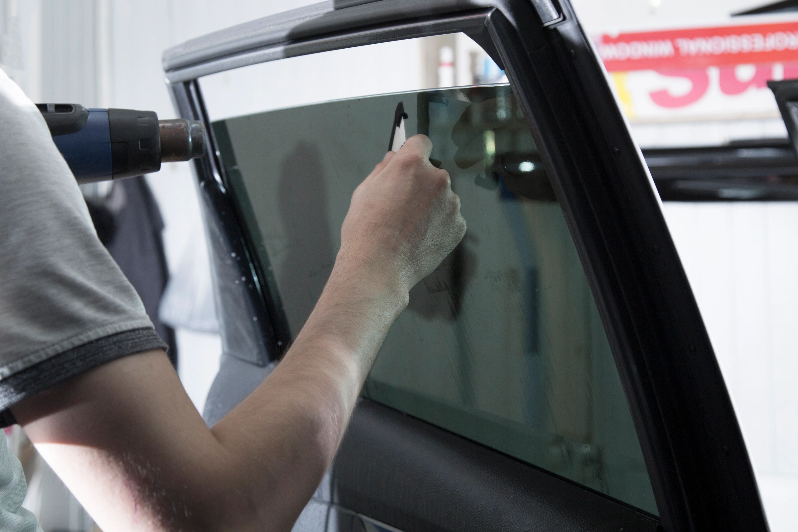 Interior view of a car with tinted windows providing comfort and privacy